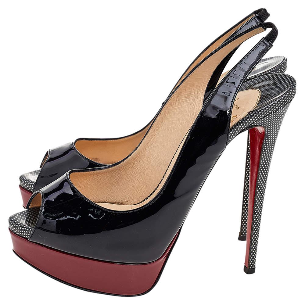 An emblematic creation originating from the House of Christian Louboutin, these gorgeous Lady Peep sandals grant glamour and chic aesthetic to your feet flawlessly. They are crafted using multicolored patent leather and are styled with peep-toes,
