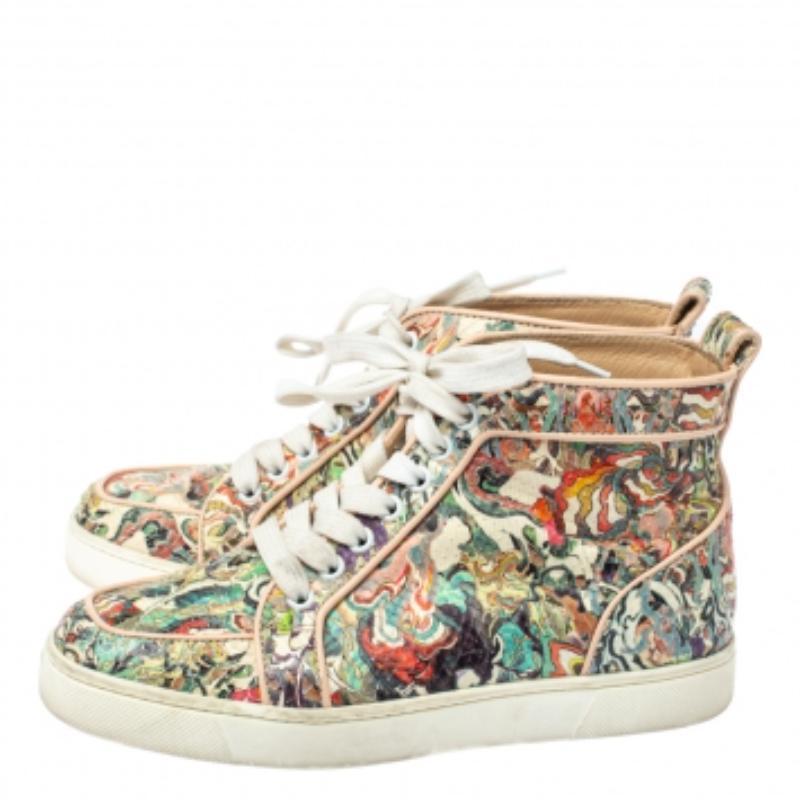 These Christian Louboutin sneakers are effortlessly suave and amazingly stylish. Brimming with intricate details, these sneakers are crafted from python and lined with leather on the insoles. They feature a lovely interplay of colors with lace-ups