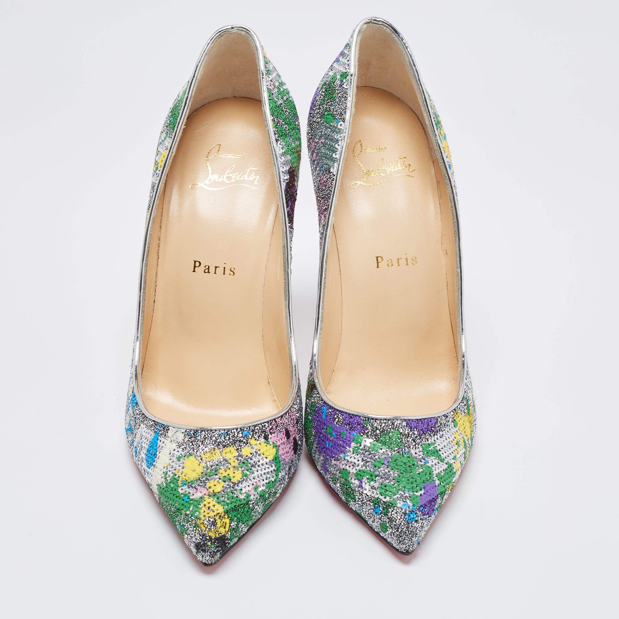 The architectural silhouette and contemporary design of this pair of Christian Louboutin pumps exemplify the brand's mastery in the art of stiletto making. Finely created from multicolored sequins and brocade fabric, it stands elegantly on 11cm