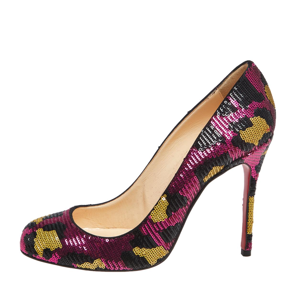 Coming from the House of Christian Louboutin, these gorgeous Fifille pumps truly exemplify elegance and excellence. They are made from multicolored sequins on the exterior and showcase rounded toes, a slip-on style, and slender heels. For a