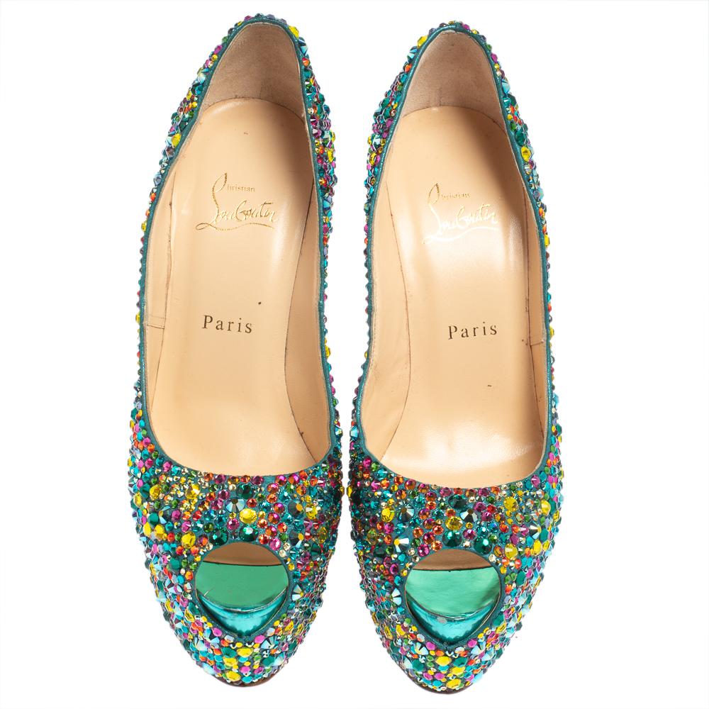 Crafted from striking embellished suede, this pair of multicolored pumps from the house of Christian Louboutin have been designed to add subtle grace to your look. A smart peep-toe silhouette makes this pair a trendy choice to make a style