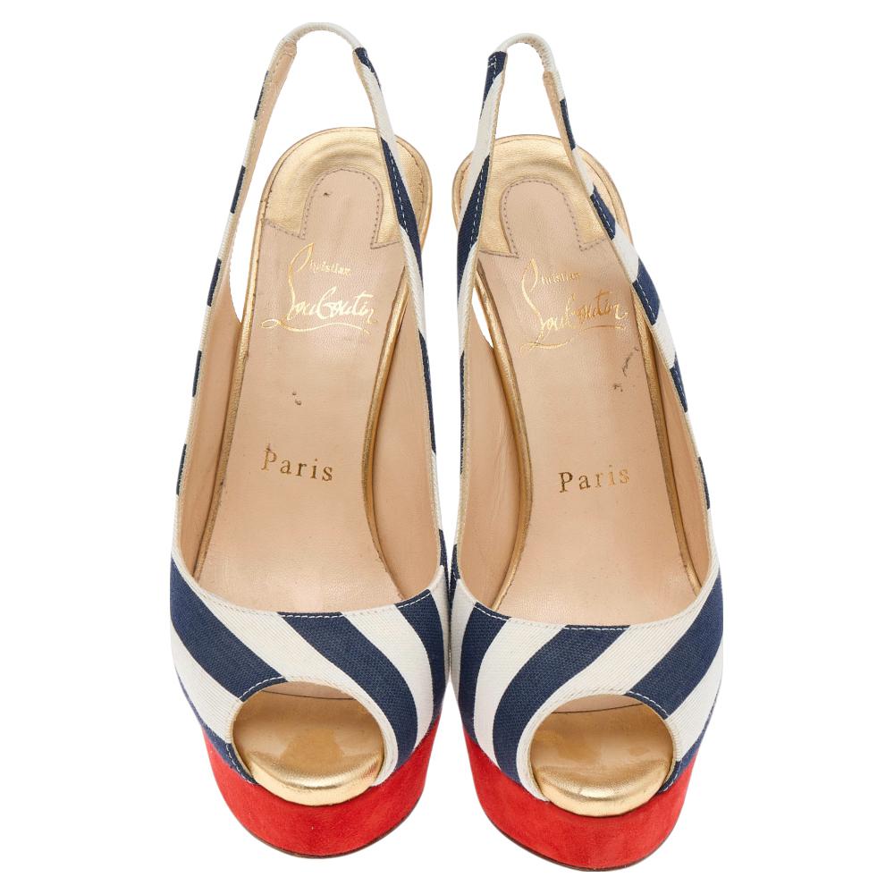 Stand out from crowd with this gorgeous pair of Louboutins that exude high fashion with class! Crafted from suede and leather, this is a creation from their Lady Peep collection. They feature a striped exterior with peep toes. Completed with leather