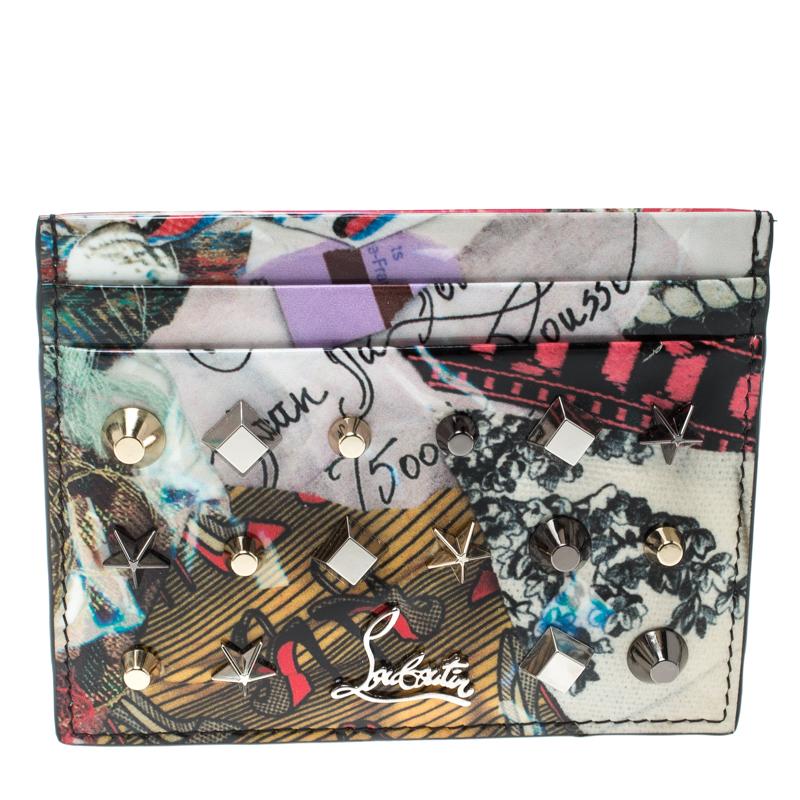 Crafted out of patent leather with trash prints and spikes, this card holder by Christian Louboutin comes equipped with multiple slots that will dutifully hold your cards. This piece is handy and can easily be carried.

Includes: Original Box,