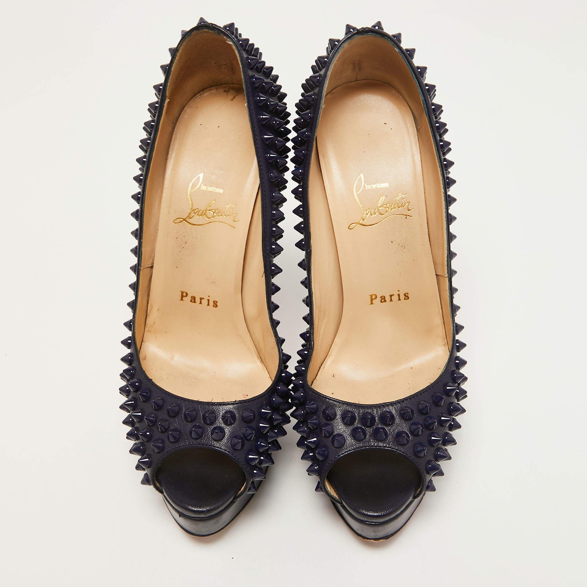 Exhibit a bold style with this pair of pumps. These CL Lady Peep pumps are crafted from quality materials. They are set on durable soles and sleek heels.

Includes: Original Dustbag, Original Box

