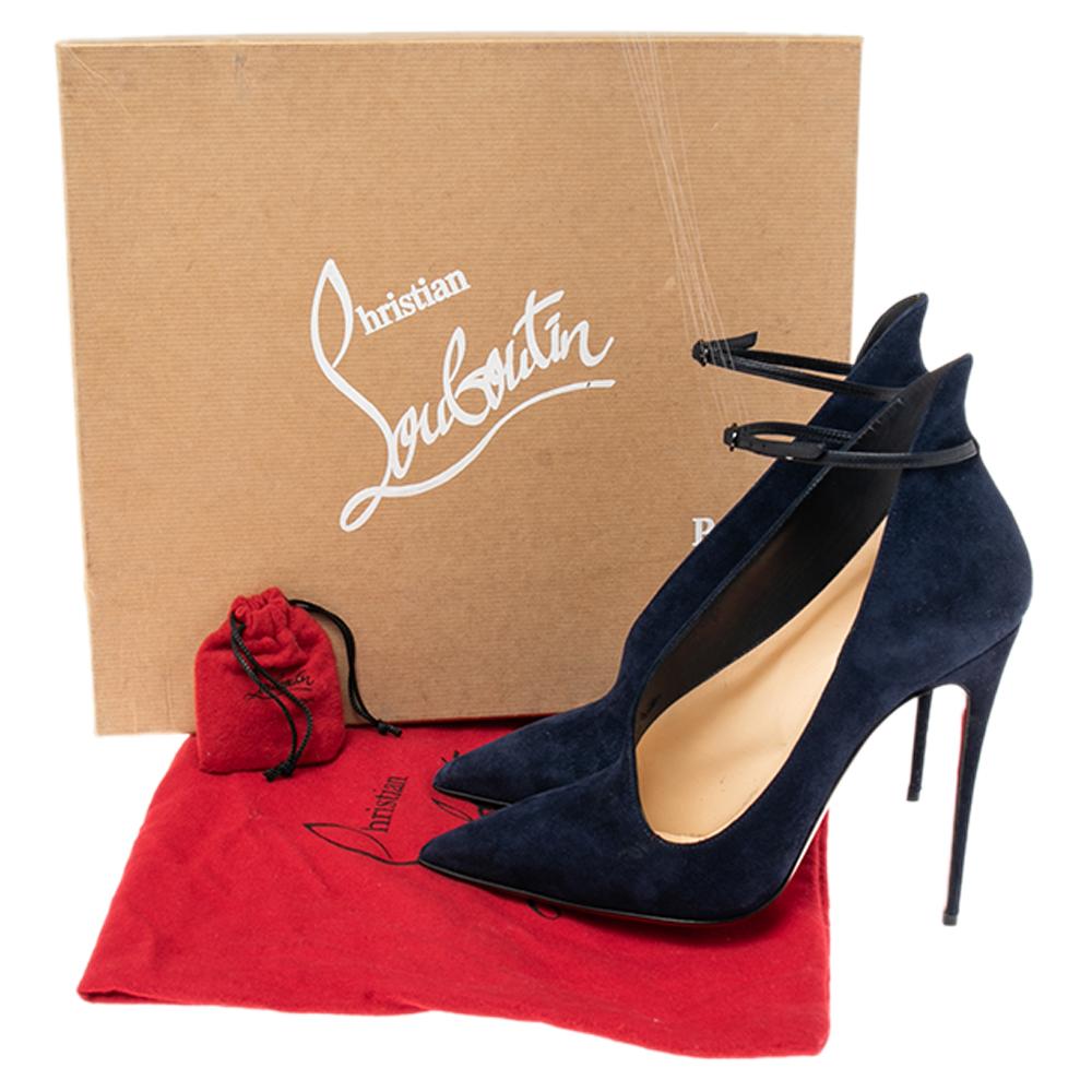 Give your feet the royal treatment wearing these luxurious ankle booties from Christian Louboutin. The navy blue suede booties flaunt a stunning silhouette and come with towering heels. Leather-lined insoles and pointed-toes complete the glamorous