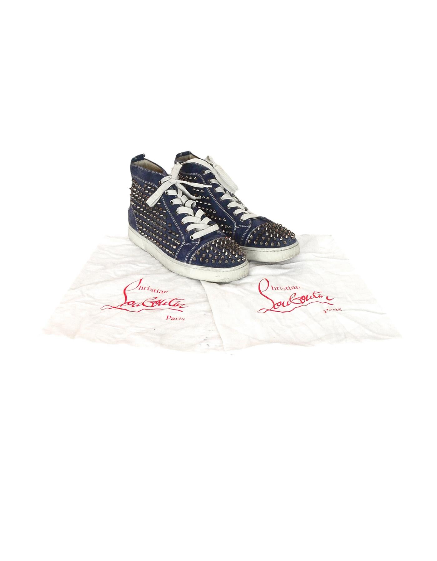 Christian Louboutin Navy Suede Louis Spiked Hi Top Sneakers Sz 40.5 W/ 2 DB

Made In: Italy
Color: Navy, off white, gunmetal 
Hardware: Gunmetal 
Materials: Suede, metal
Closure/Opening: Lace up front 
Overall Condition: Good pre-owned condition