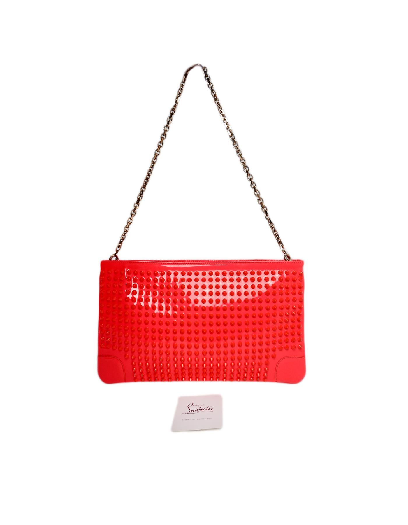 neon pink patent clutch bag