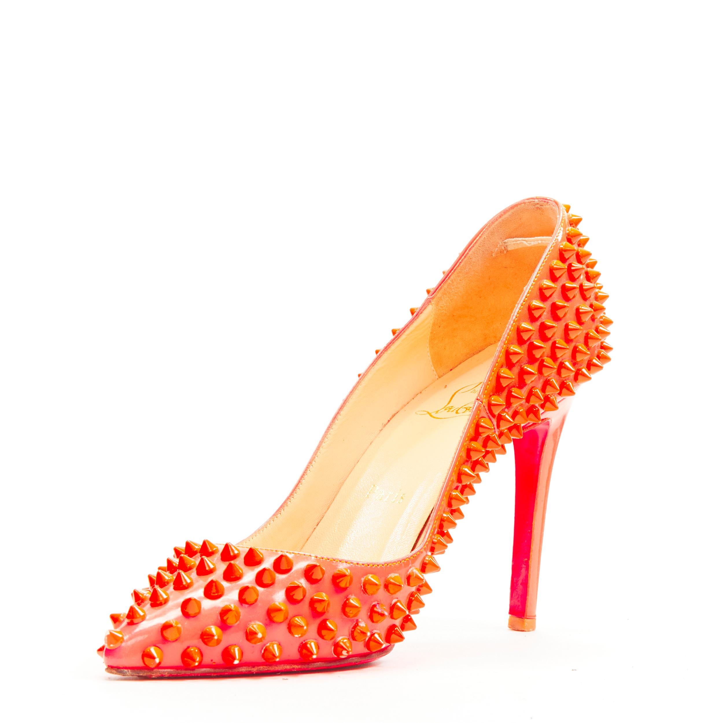 Women's CHRISTIAN LOUBOUTIN neon pink patent spike stud point toe pigalle pump EU37.5