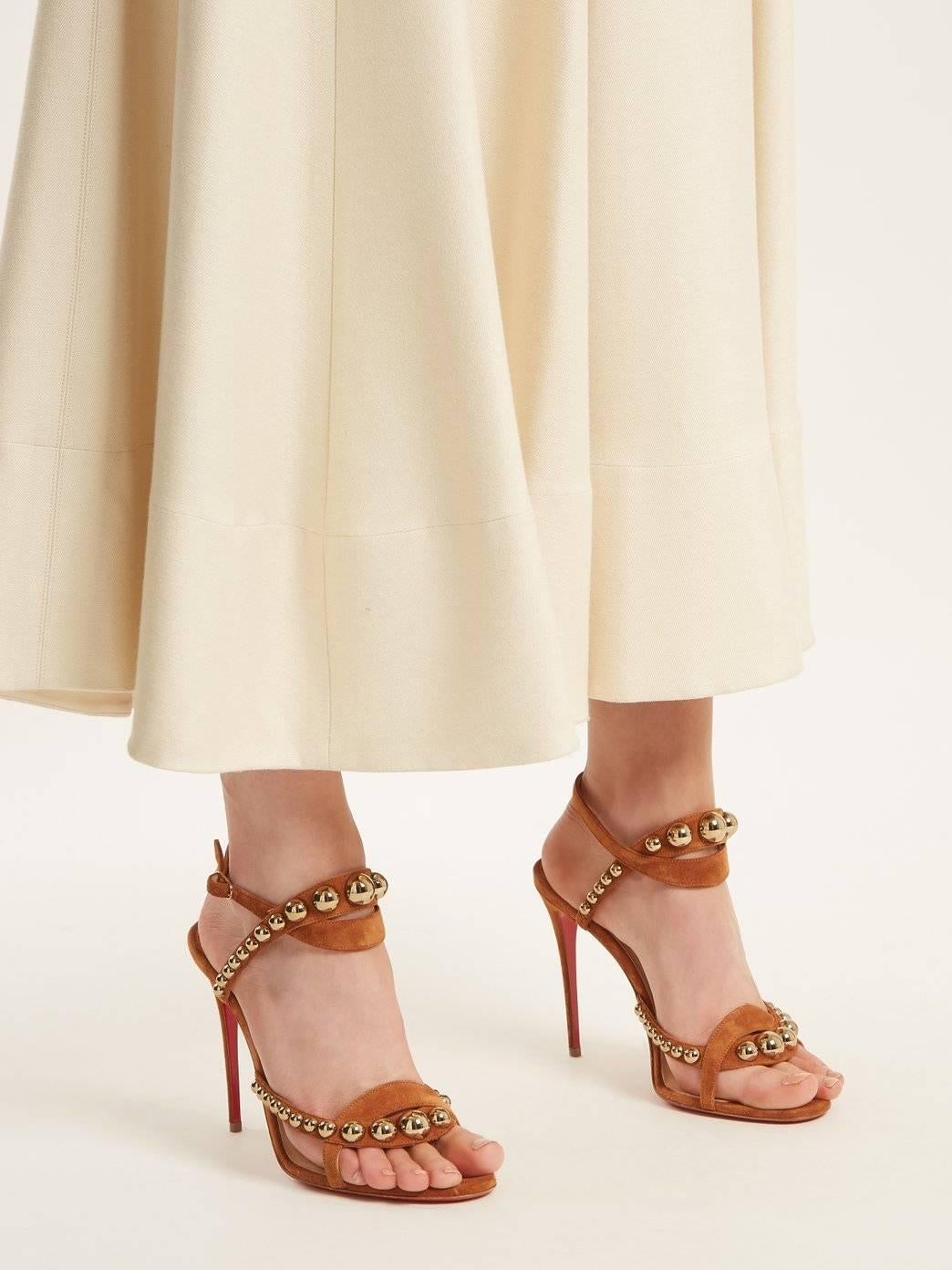 Christian Louboutin New Cognac Suede Gold Stud Evening Sandals Heels in Box

Size IT 36
Suede
Metal
Gold tone hardware
Buckle closure
Made in Italy
Heel height 4.25