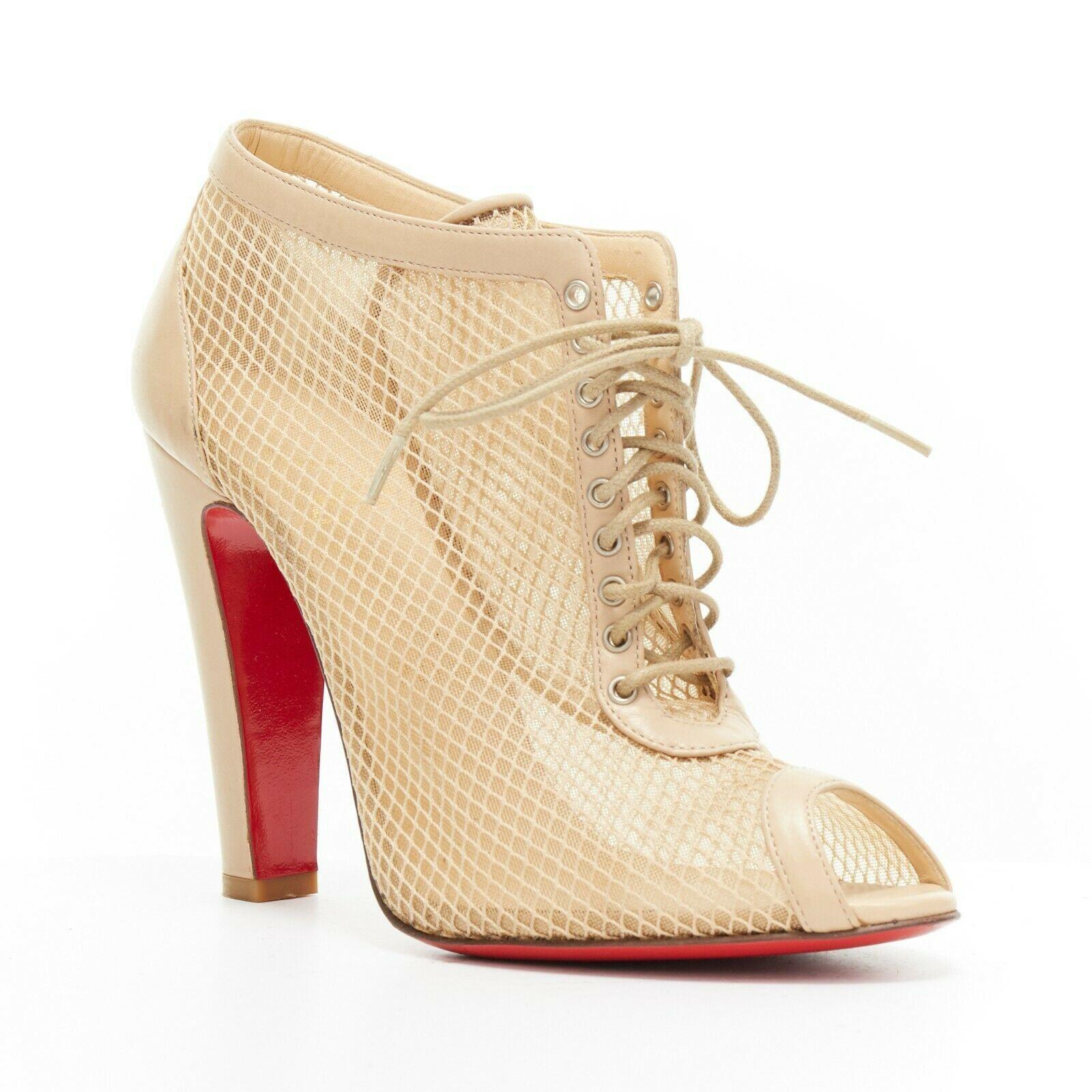 CHRISTIAN LOUBOUTIN Nikita 100 nude mesh peeptoe laced chunky heel bootie EU38
CHRISTIAN LOUBOUTIN
Nikita 100. Nude mesh and fishnet overlay. 
Nude leather trimming. Laced front closure. Peep toe. 
Chunky high heel. Padded tan leather lining.