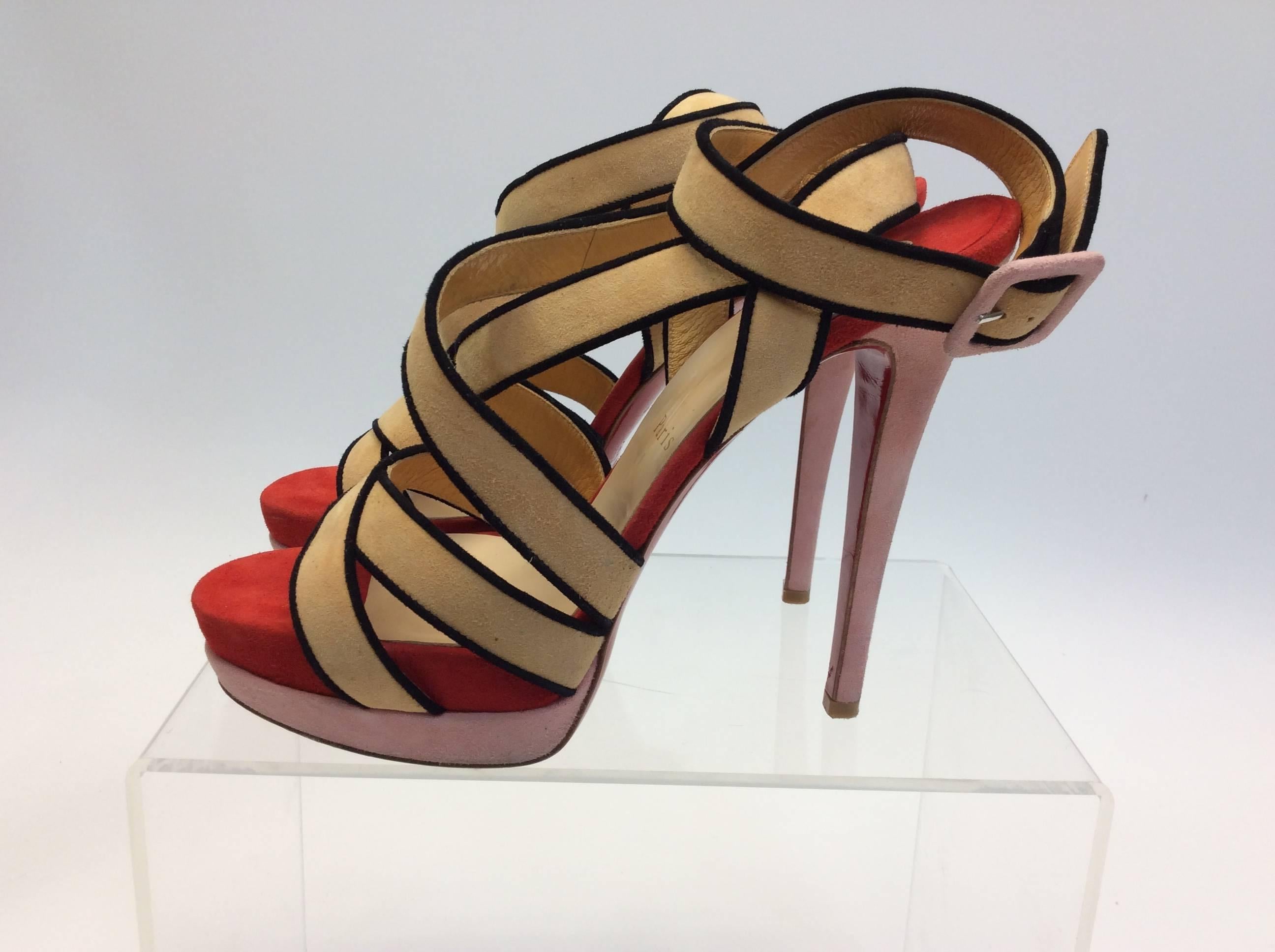 Christian Louboutin Nude, Red, and Pink Suede Sandals
$299
Made in Italy
Size 39
5.5