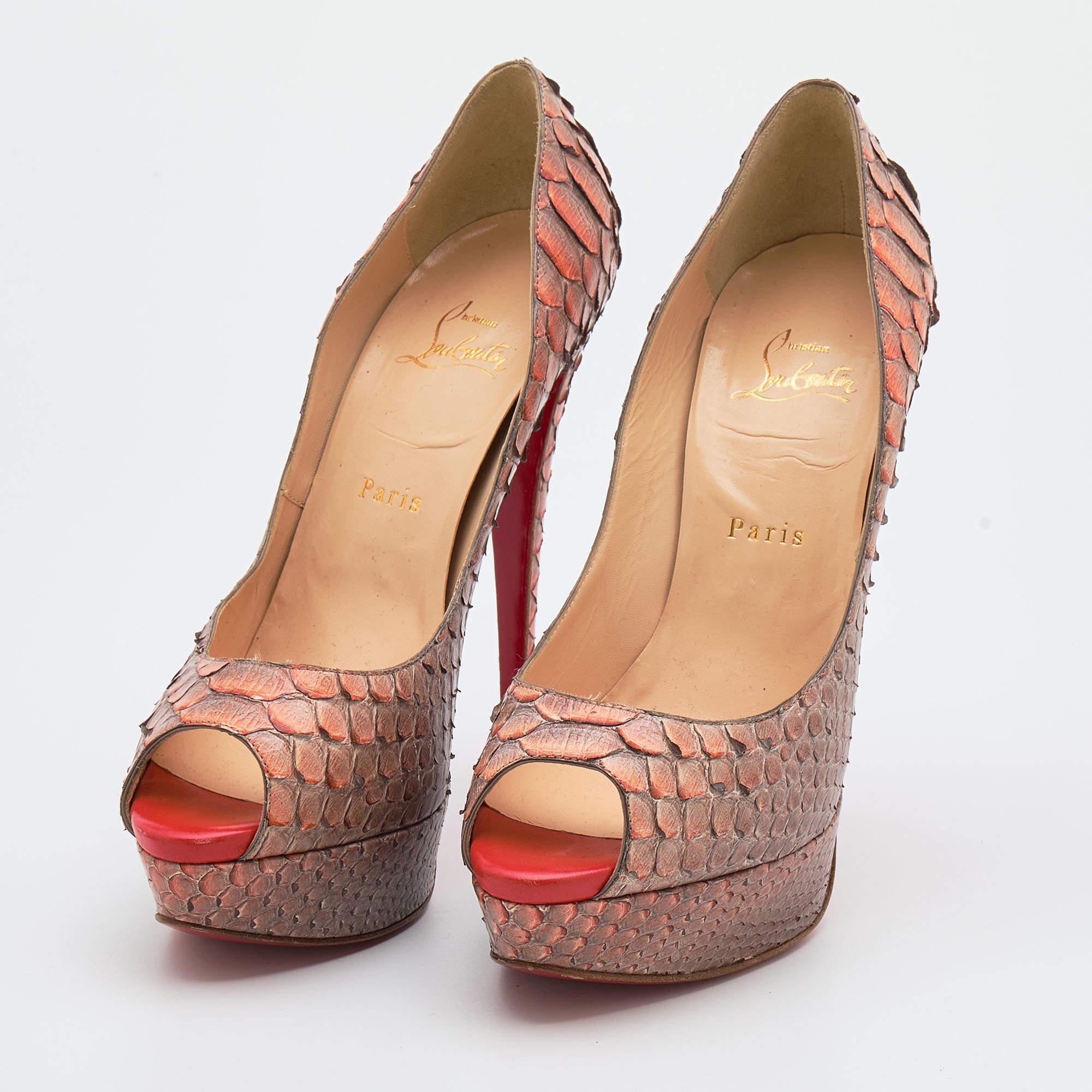 The architectural silhouette and precise cuts of this pair of pumps from Christian Louboutin exemplify the brand's mastery in the art of stiletto making. Finely created from python leather, it has been detailed with 14.5cm heels and platforms. The