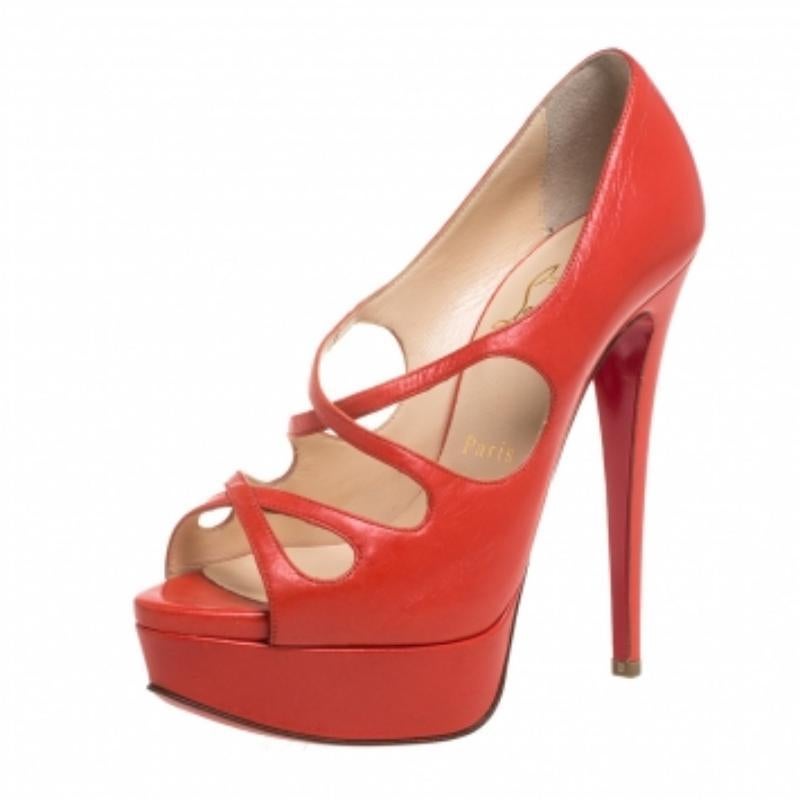 Flawless, these Louboutin pumps will prove to be an amazing buy! They are brought to life using leather and styled with peep toes, crisscross vamp straps, and 14 cm heels. Comfortable leather-lined insoles and solid platforms complete this