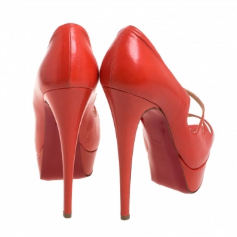 Christian Louboutin Orange Leather Mademoi Criss Cross Peep Toe Pumps Size 36.5 For Sale 3