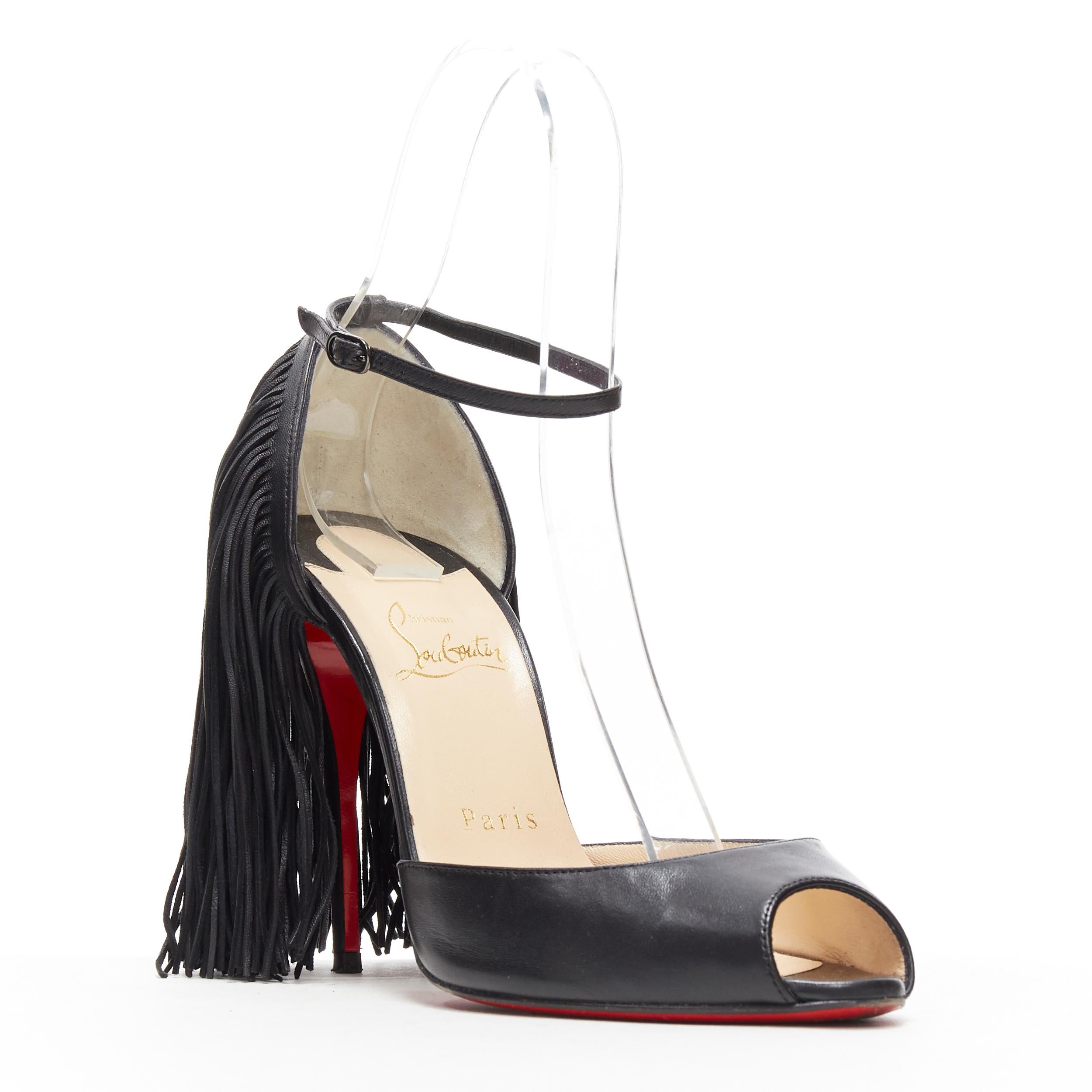 CHRISTIAN LOUBOUTIN Otrot 110 black leather fringe heel peep toe pumps EU37
Brand: Christian Louboutin
Designer: Christian Louboutin
Model Name / Style: Otrot 120
Material: Leather
Color: Black
Pattern: Solid
Closure: Buckle
Extra Detail: Ultra High