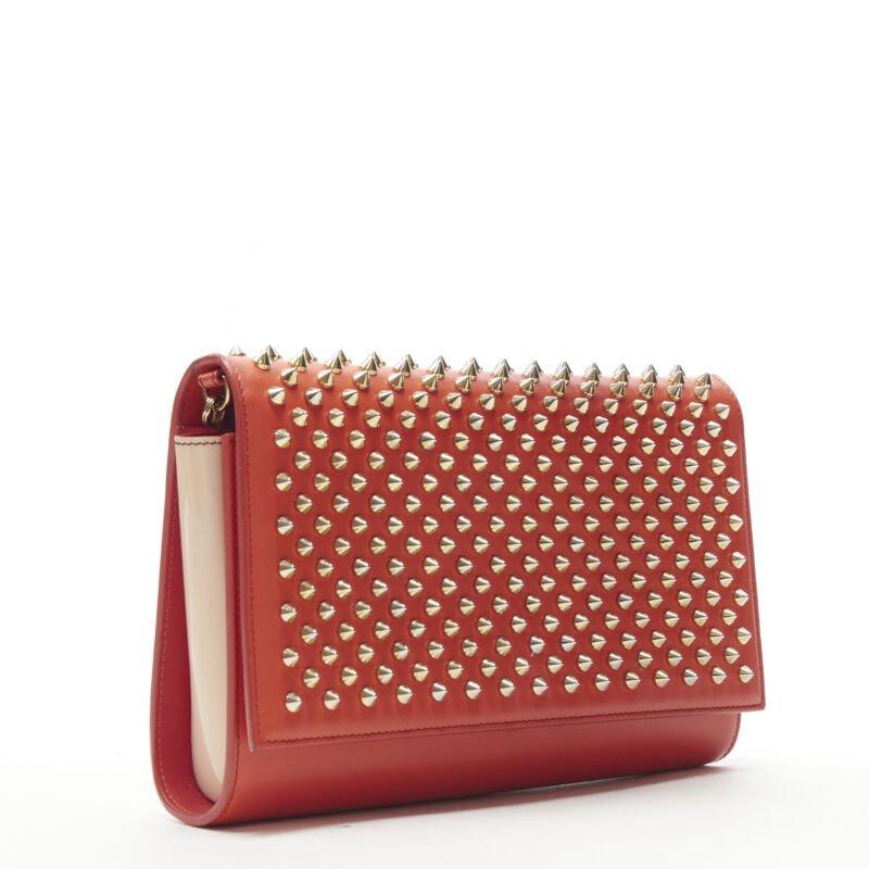 Arancia Christian Louboutin Paloma, borsa a tracolla con catena in oro e borchie in rosa in vendita