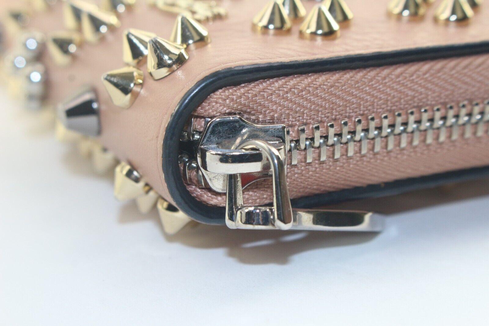 Christian Louboutin Panettone Loubinthesky Zippy Wallet 2CL1129K
Date Code/Serial Number: N/A

Made In: Italy

Measurements: Length:  8