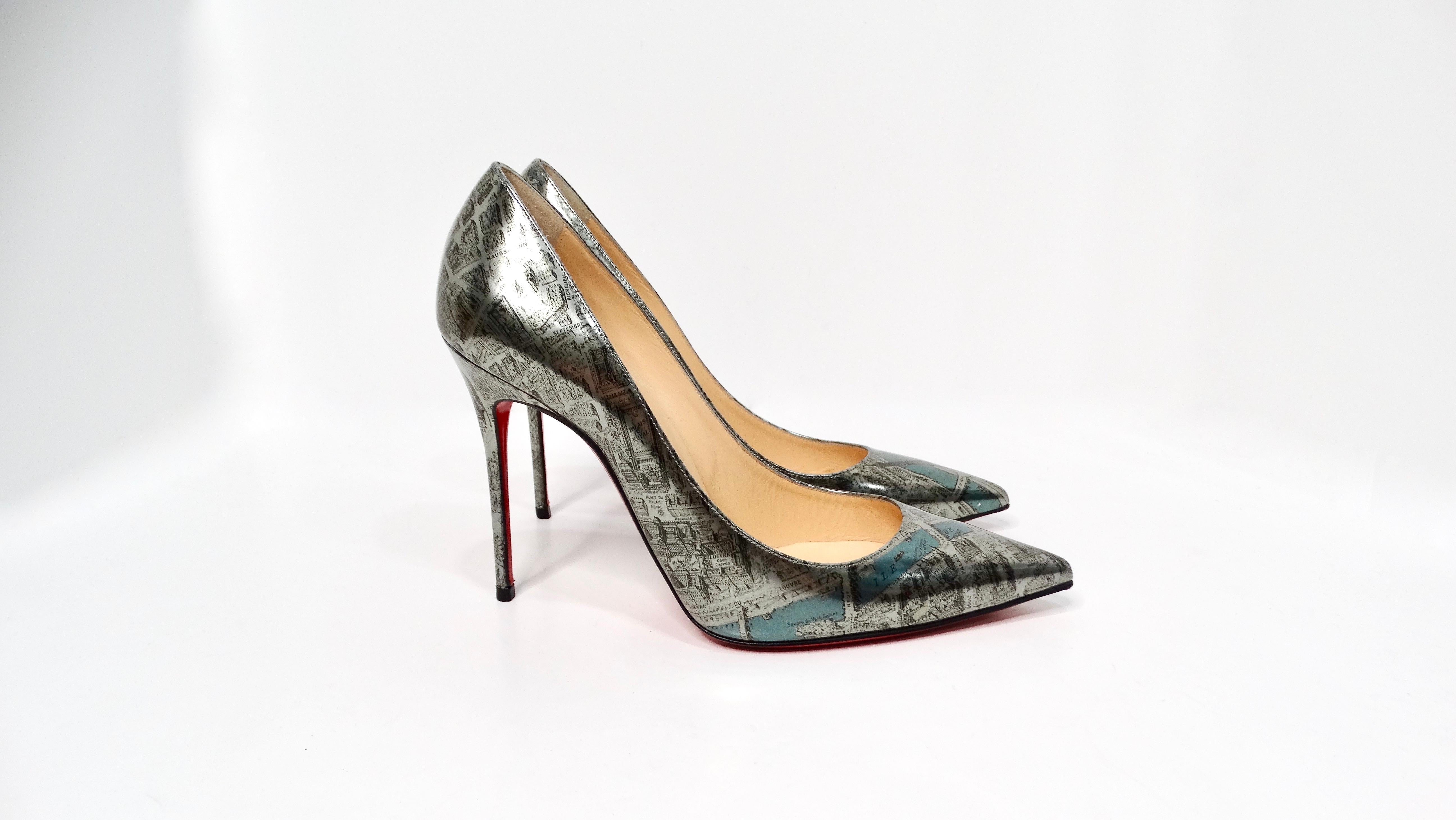 Indulge in the city of love with the Christian Louboutin Paris Map Metallic Patent Leather Decolette Stiletto Pumps. These striking heels showcase a unique silver metallic patent leather finish adorned with a whimsical map of Paris, featuring