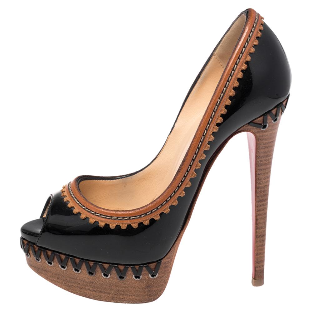 Be at the top of your style game by donning this pair of pumps, crafted from patent leather. These pumps, from Christian Louboutin, showcase a luxurious and stylish look you simply cannot miss. They stand on tall heels and are supported by wood