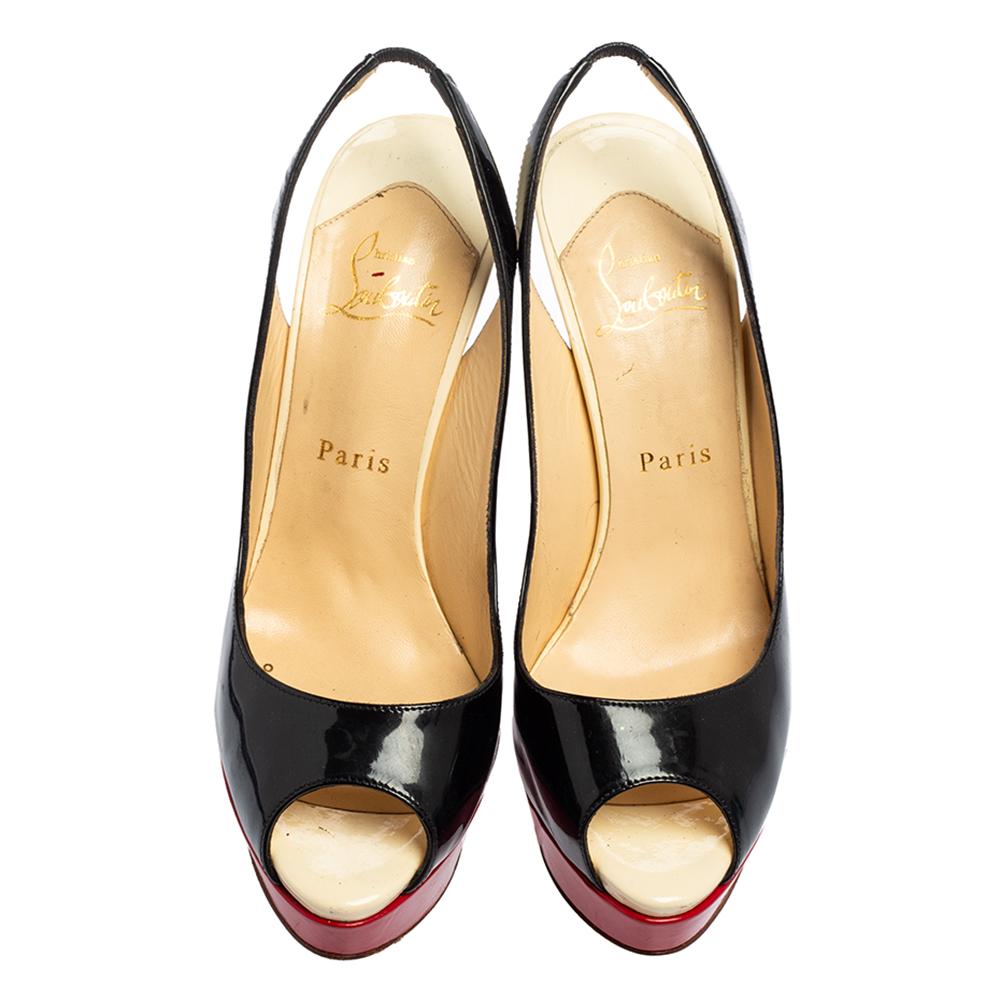 An emblematic creation originating from the House of Christian Louboutin, these gorgeous Lady Peep pumps grant glamour and chic aesthetic to your feet flawlessly. They are crafted using black-red patent leather and are styled with peep-toes,