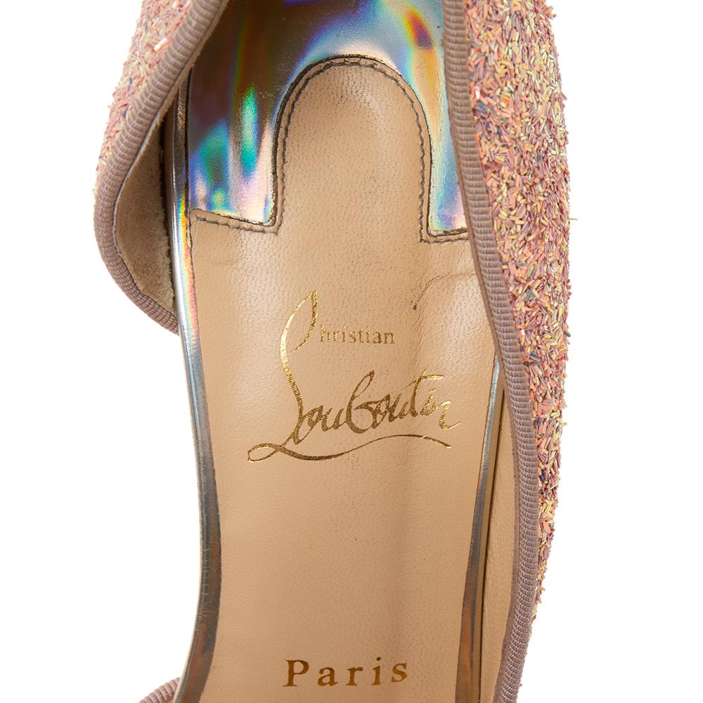 Christian Louboutin remains unmatched in terms of creating high-quality and amazing designer footwear. These Iriza D'orsay pumps are truly beautiful in every way. They have been created using peach pink glitter on the upper and feature pointed-toes