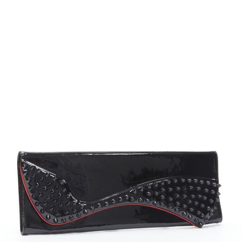 Noir CHRISTIAN LOUBOUTIN clous d'oreilles Pigalle à motif d'araignée en brevet noir  pochette à rabat en vente