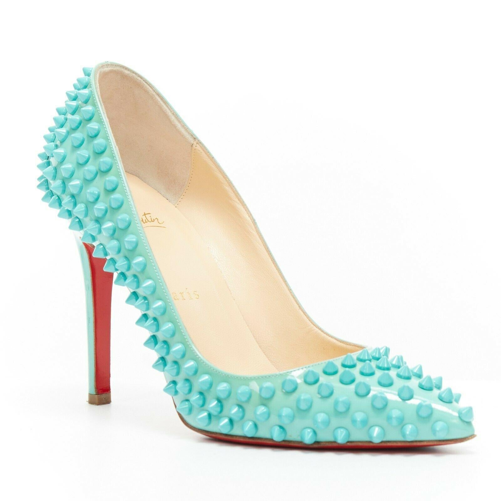 CHRISTIAN LOUBOUTIN Pigalle Spikes sky blue patent tonal stud pointy pump EU37.5
CHRISTIAN LOUBOUTIN
Pigalle Spikes. 
Sky blue patent leather upper. 
Spike stud all-over embellishment. 
Tonal stitching. Slim high heel. Padded tan leather lining.