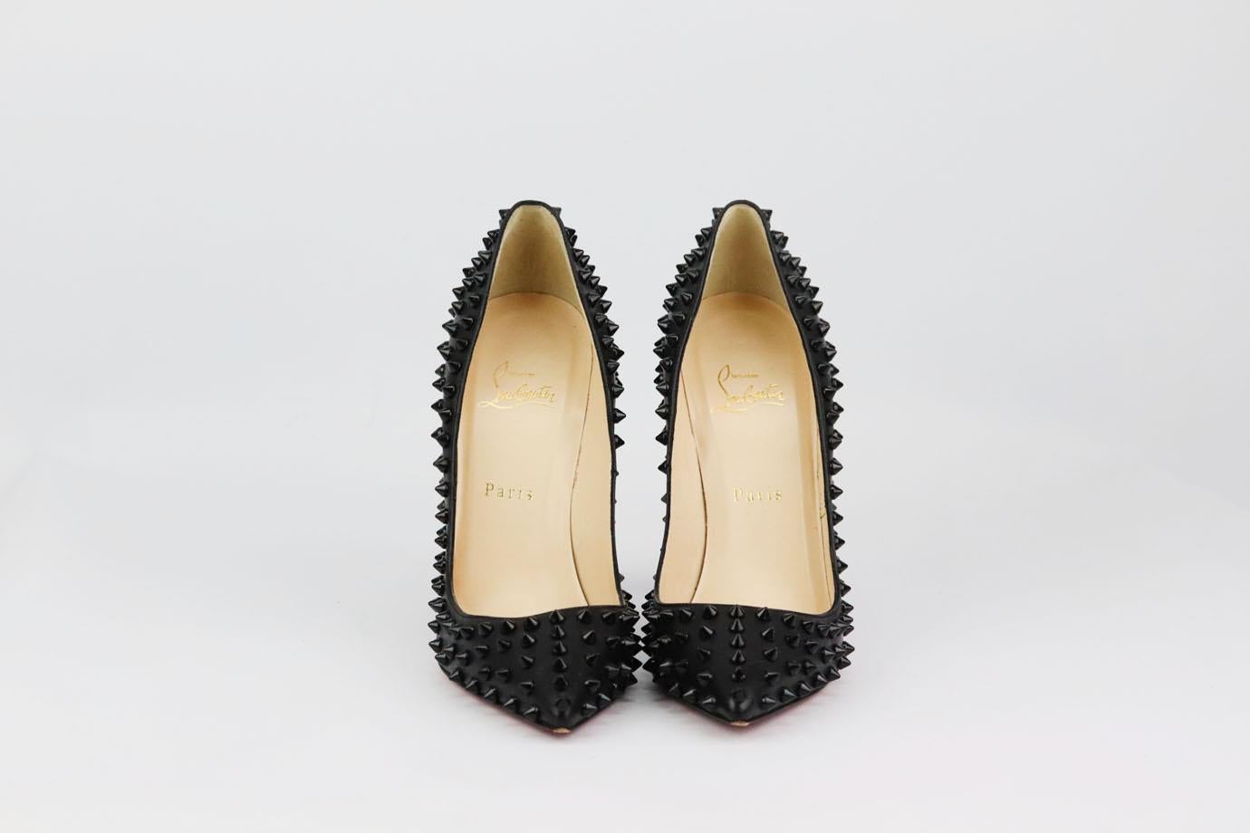 These ‘Pigalle’ pumps by Christian Louboutin are made from black leather with a razor-sharp stiletto heel and spiked stud embellishment for a tough-luxe evening choice. Heel measures approximately 120mm/ 5 inches. Black leather. Slip on. Does not