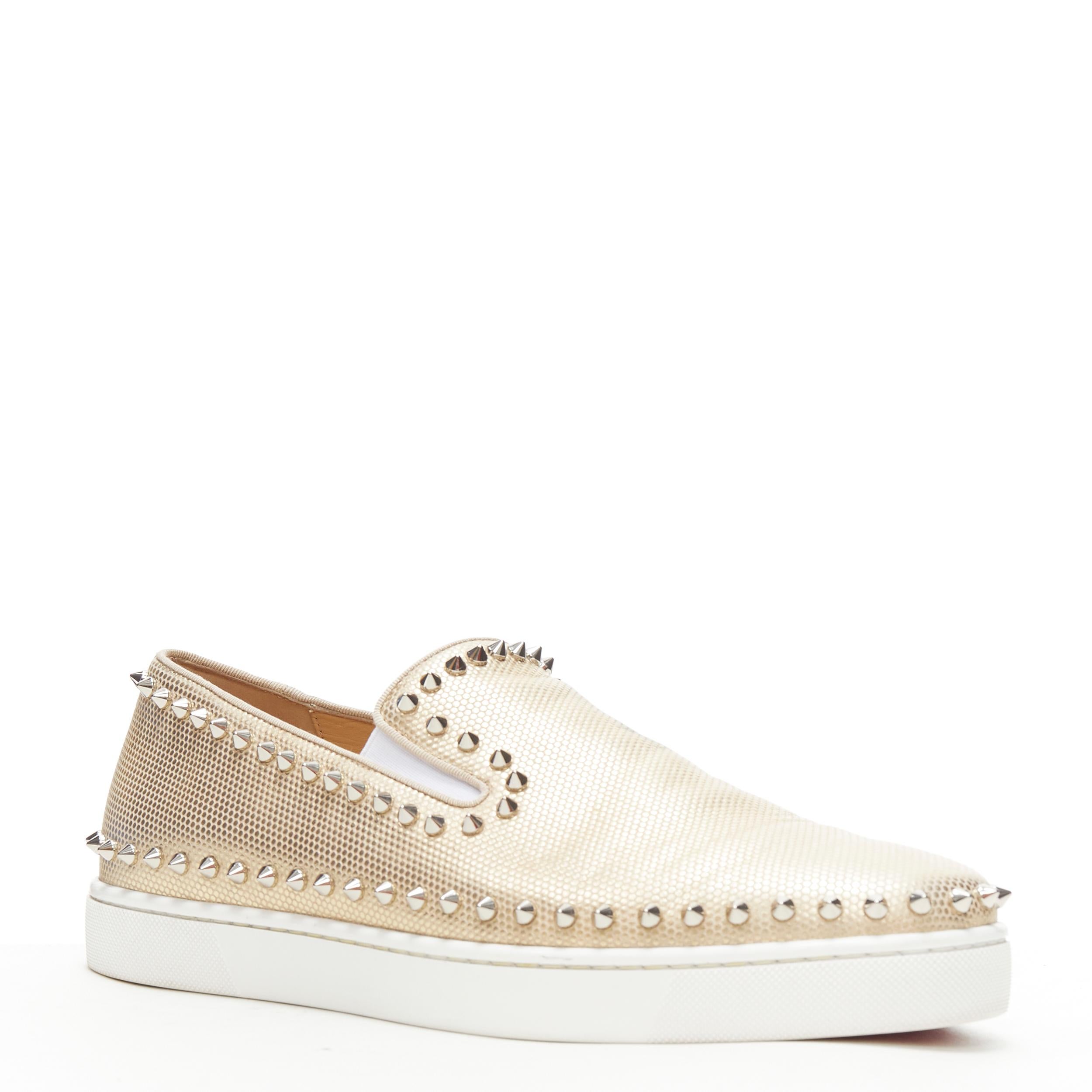 CHRISTIAN LOUBOUTIN Pik Boat gold leather spike stud low skate sneakers EU43 
Reference: TGAS/B01036 
Brand: Christian Louboutin 
Designer: Christian Louboutin 
Model: Pik boat gold 
Material: Leather 
Color: Gold 
Pattern: Solid 
Extra Detail: