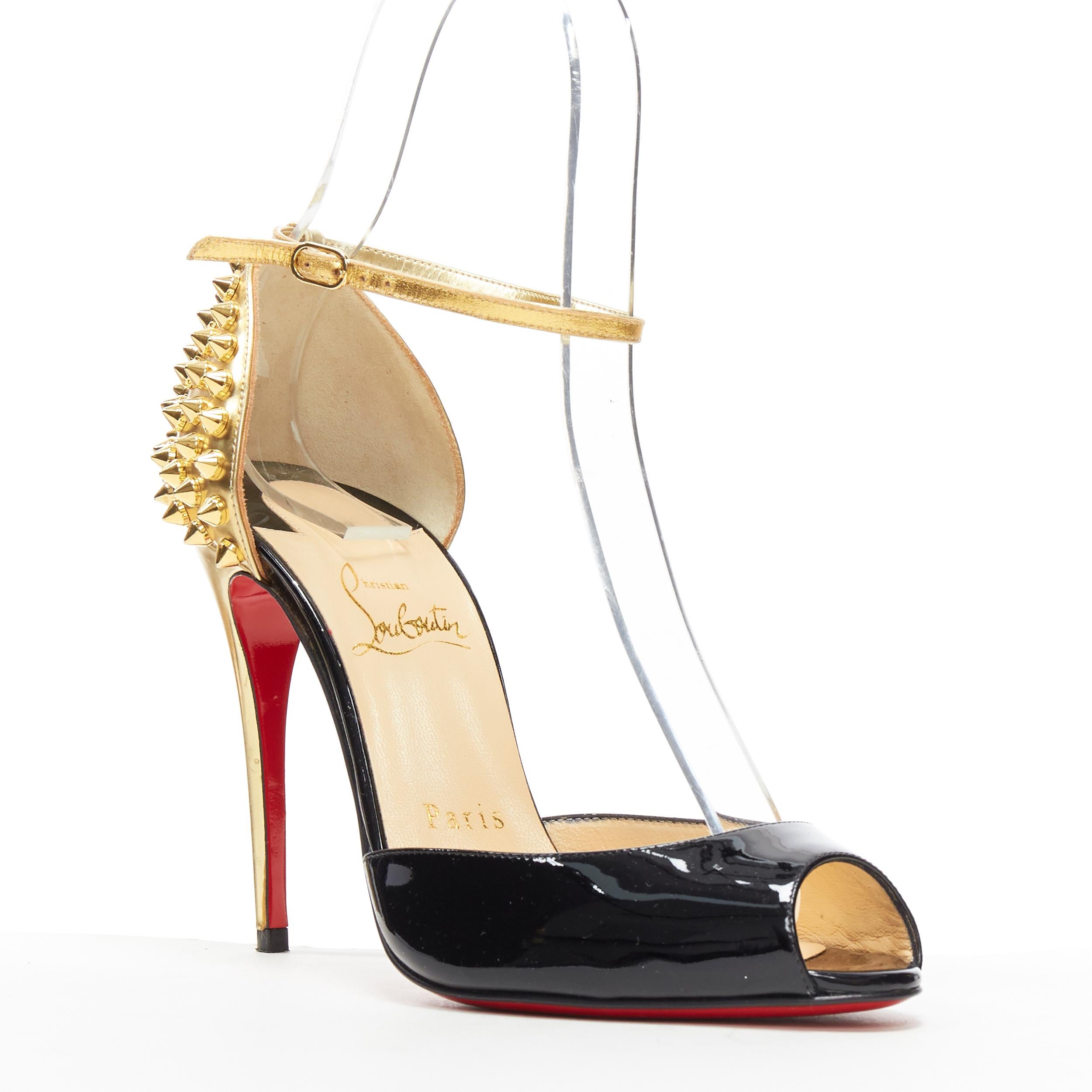 CHRISTIAN LOUBOUTIN Pina Spike black patent gold studded peep toe sandals EU36.5
Brand: Christian Louboutin
Designer: Christian Louboutin
Model Name / Style: Pina Spike
Material: Patent leather
Color: Black, gold
Pattern: Solid
Closure: Ankle