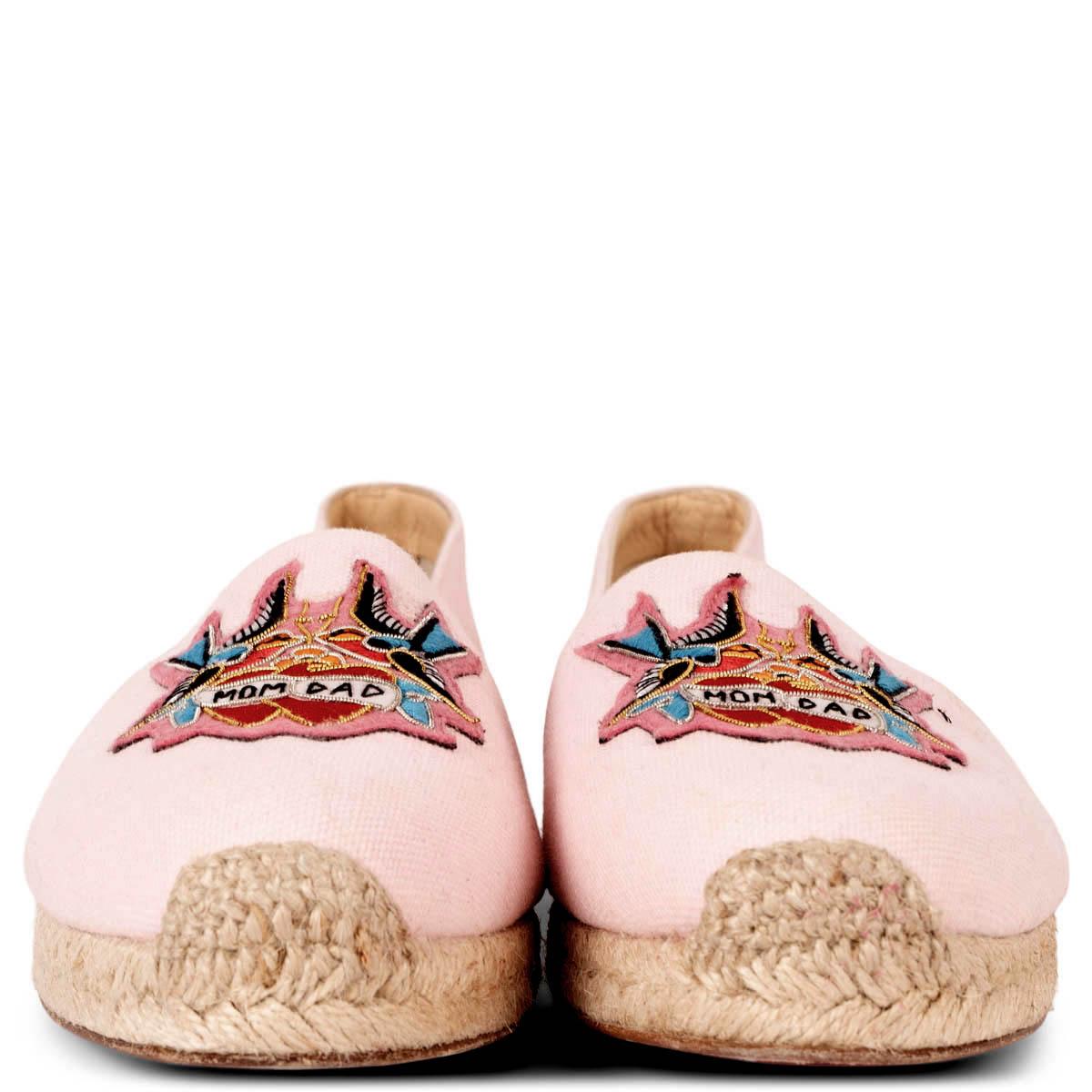 100% authentic Christian Louboutin Mom & Dad espadrille flats in pink canvas  embellished with multicolor patch. Have been worn and are in excellent condition. 

Measurements
Imprinted Size	39
Shoe Size	38.5
Inside Sole	25.5cm (9.9in)
Width	7.5cm