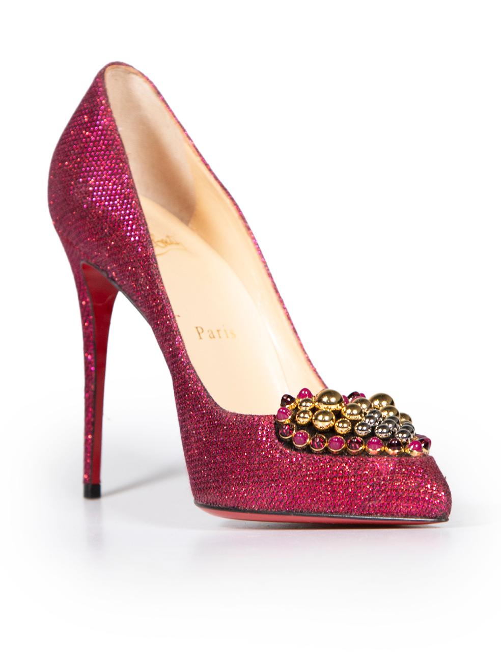 CONDITION is Very good. Hardly any visible wear to shoes is evident on this used Christian Louboutin designer resale item.
 
 
 
 Details
 
 
 Model: Coralta
 
 Pink
 
 Glitter
 
 Heels
 
 Point toe
 
 Slip on
 
 Heart studded detail
 
 Signature