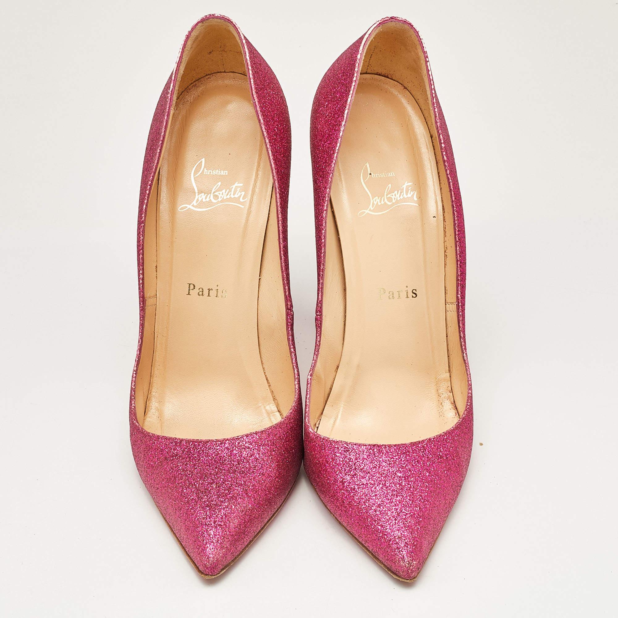 The classic pointed toes and signature red-lacquered sole characterize this pair of Christian Louboutin pumps. Crafted from glitter, it has been styled in a pink shade and a leather insole. The sleek heels and durable construction signify the