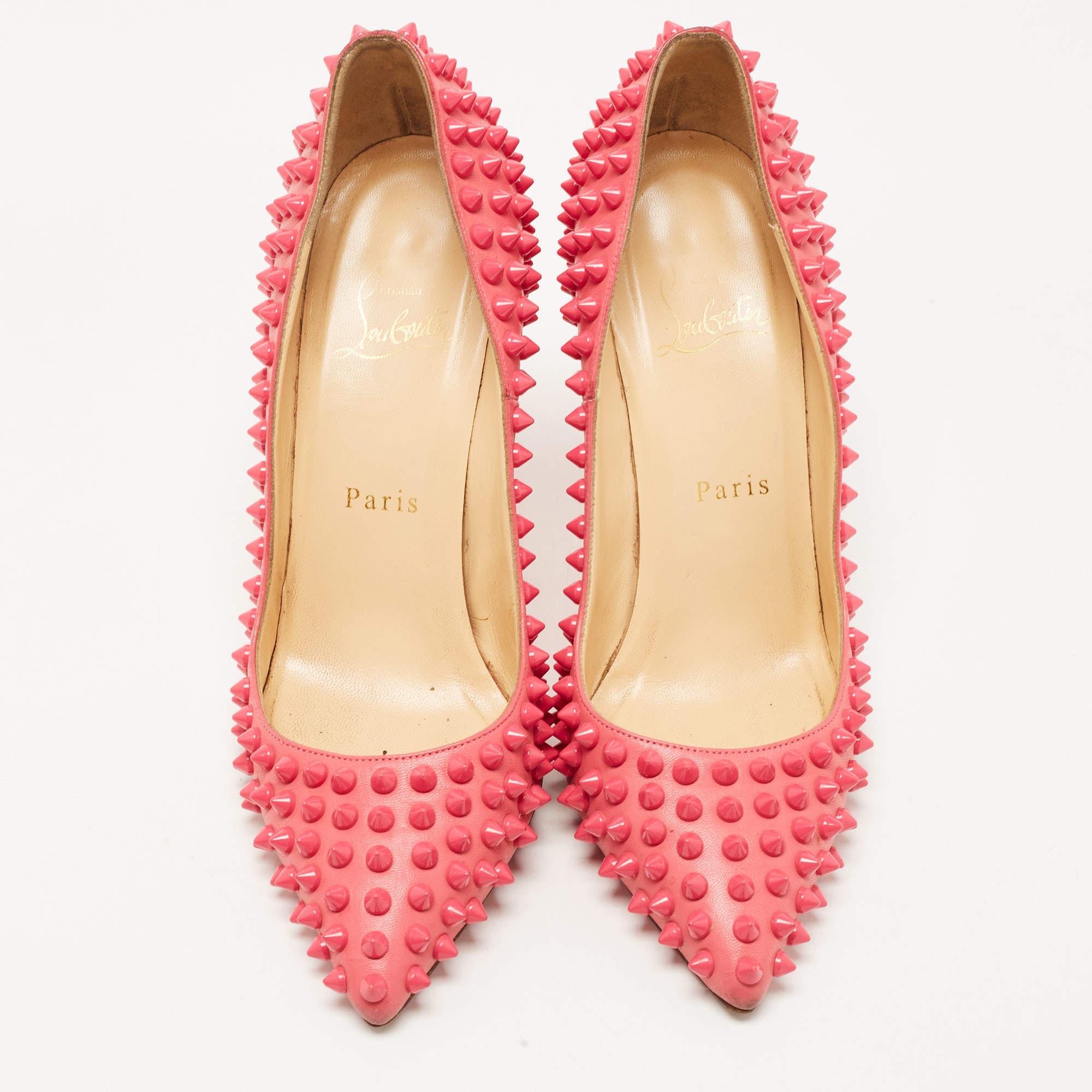 Add a statement finish with these Louboutins. Presented in pink leather, these Pigalle Spike pumps carry eye-catching details, pointed toes, and 10 cm heels. Complete with the signature red soles, this pair truly embodies the fine art of