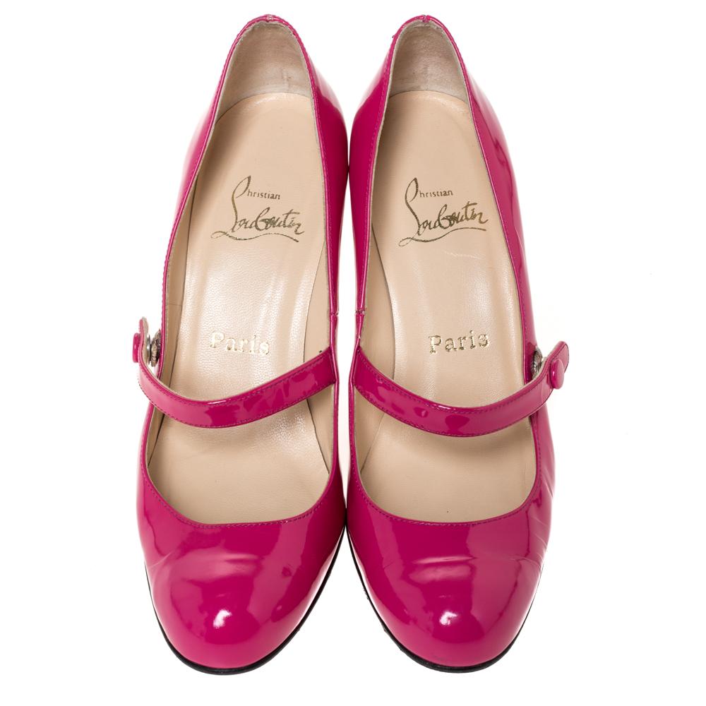 Louboutins are designed to lift one's attitude and outfit. Let this pair lift yours as well by owning them today. Crafted from patent leather, these pink pumps carry covered toes, Mary Jane straps and a sleek silhouette. Completed with 9 cm heels