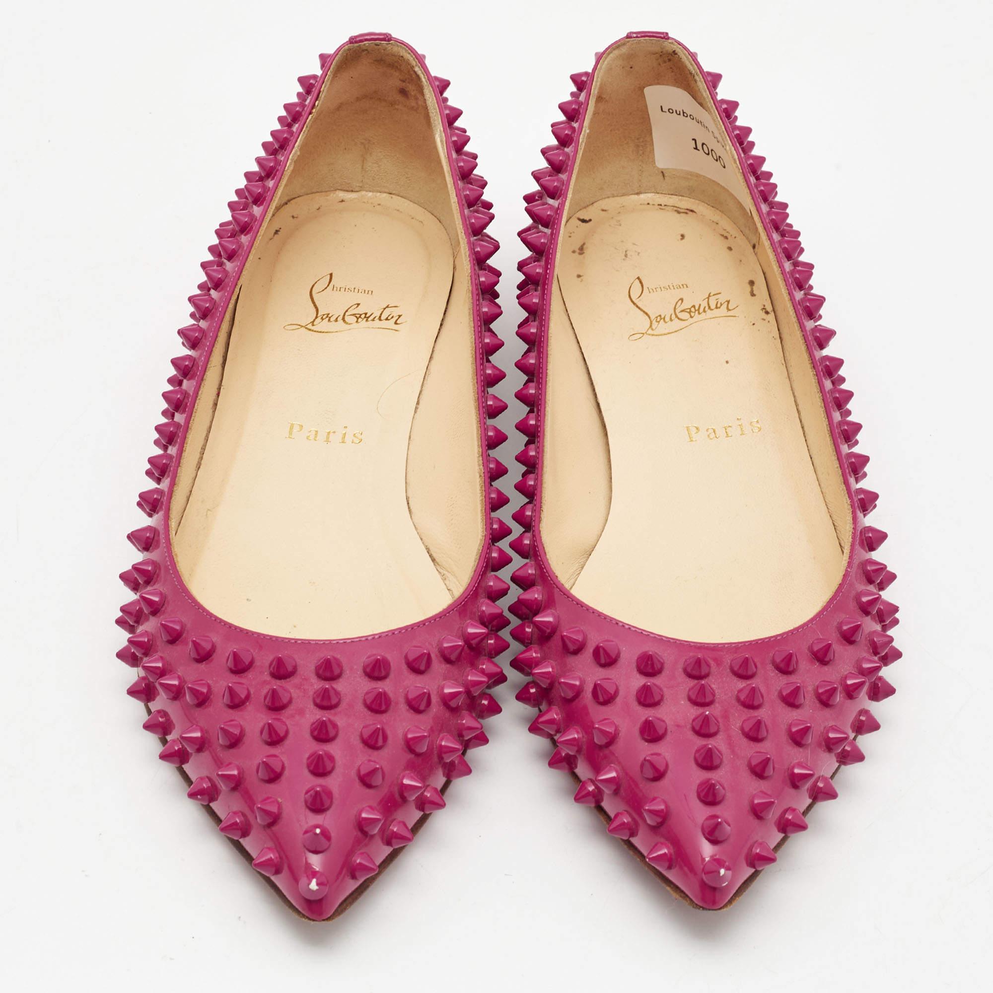 Complete your look by adding these Christian Louboutin spike ballet flats to your collection of everyday footwear. They are crafted skilfully to grant the perfect fit and style.

Includes: Original Dustbag

