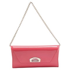 Christian Louboutin pochette à chaîne vero Dodat en cuir verni rose