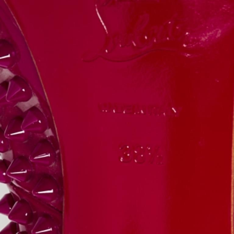 The spikes on the exterior of this pair of Christian Louboutin pumps make it undeniably edgy. Crafted from leather in a hot pink shade, it features peep-toes, 11.5cm heels, and precise cuts. The signature red-lacquered soles adds a touch of