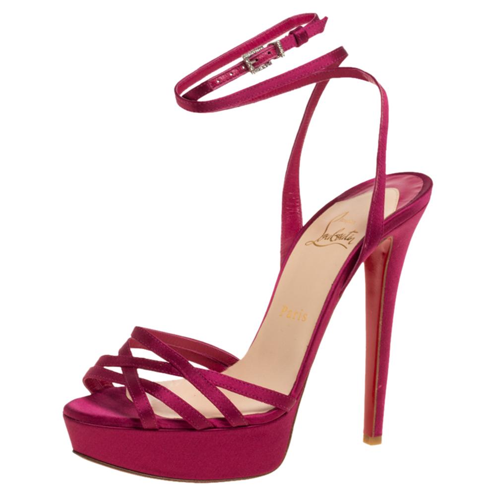 These beautiful sandals have been styled with perfection just so a diva like you can flaunt them. Breathtaking in pink, they have been crafted from satin and designed with open toes, entwined vamp straps, and ankle wraps with buckle fastenings.