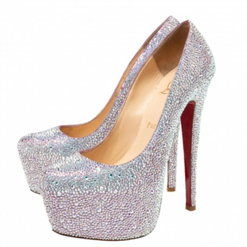 Take your love for Louboutins to new heights by adding this gorgeous pair to your collection. The pumps simply speak high fashion in every stitch and curve. The exteriors come made from suede accented with embellishments all over and the pumps are