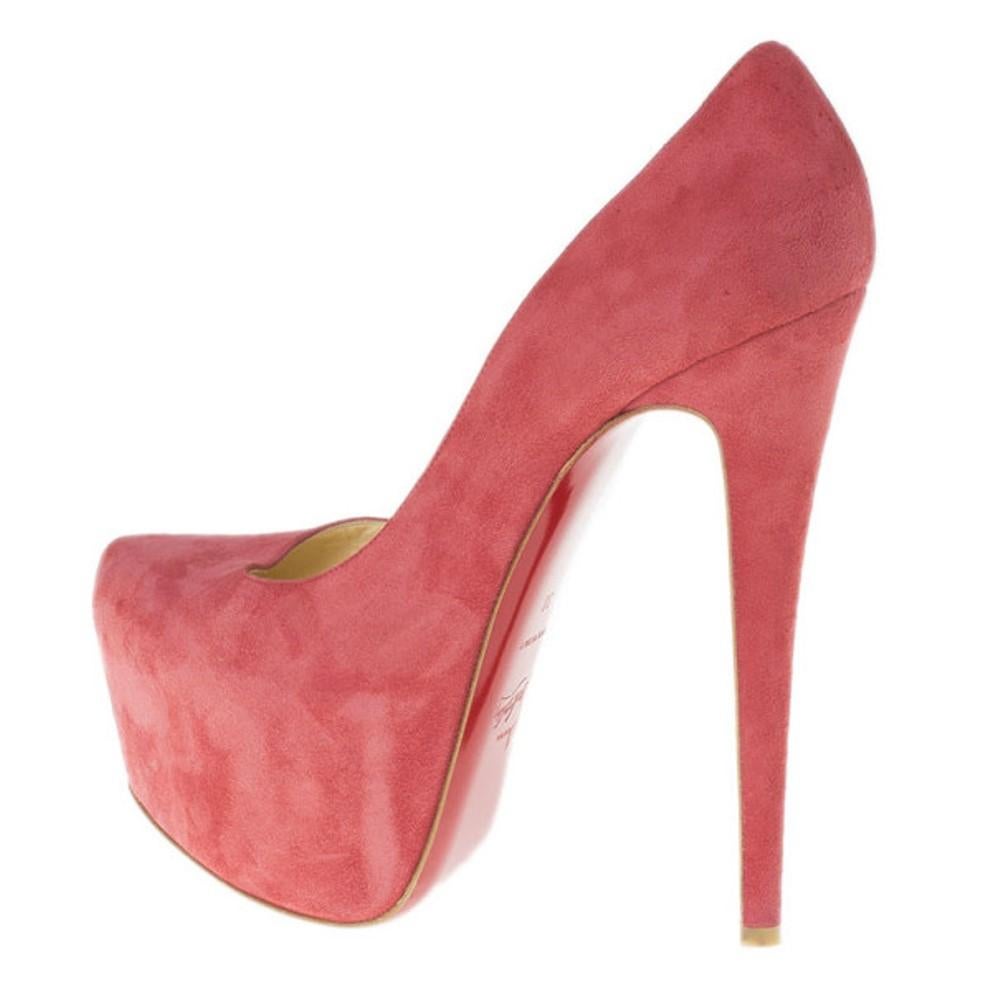 These stunning Christian Louboutin Daffodile pumps will definitely give you that extra lift you are looking for. Made from puce pink suede, these pumps feature hidden 6cm platforms, almond toes, and 16cm heels. They are lined with soft beige leather