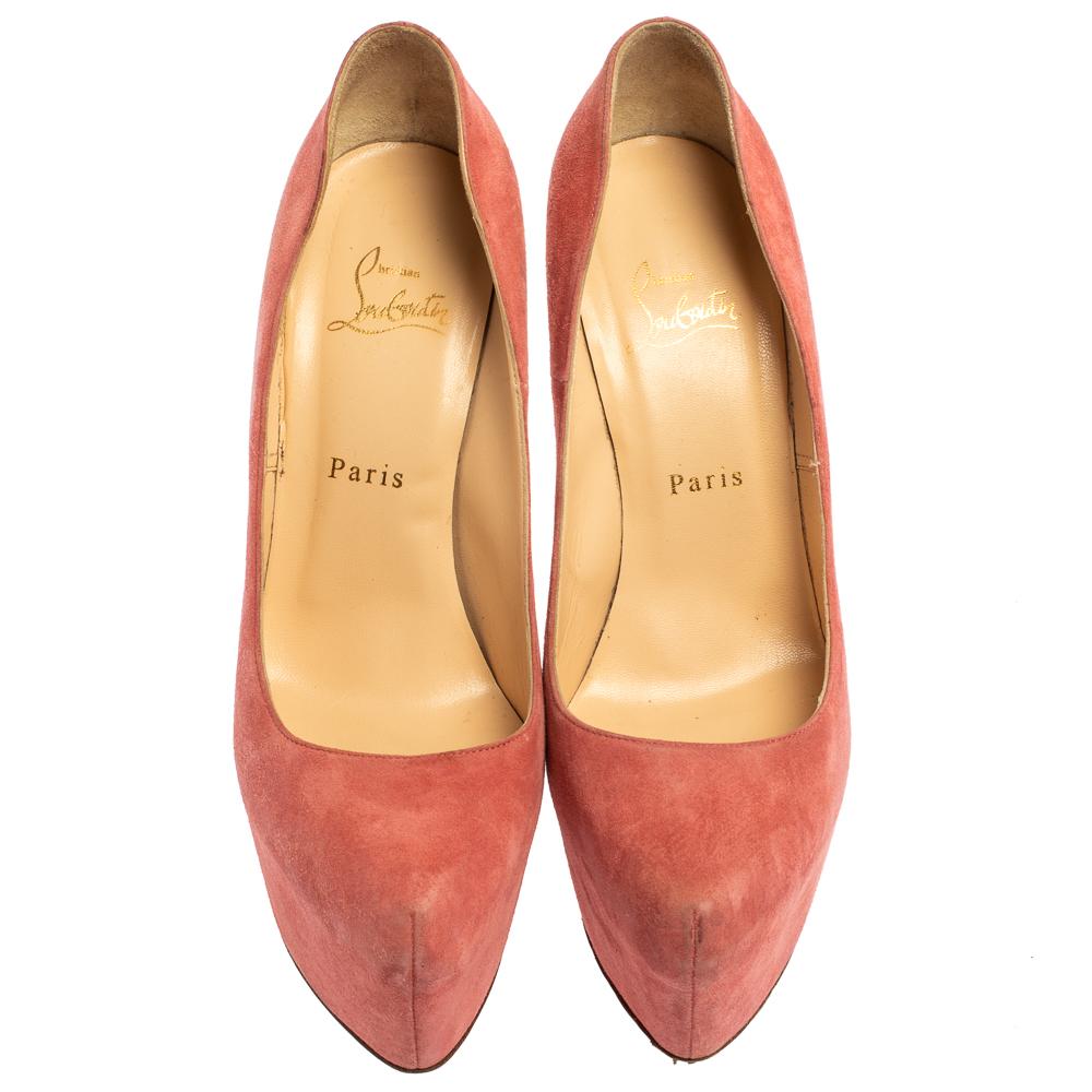 These stunning Daffodile pumps by Christian Louboutin will definitely give you that extra lift you are looking for. Made from pink suede, these pumps feature concealed platforms, almond toes, and 16cm heels. They are lined with soft leather and are