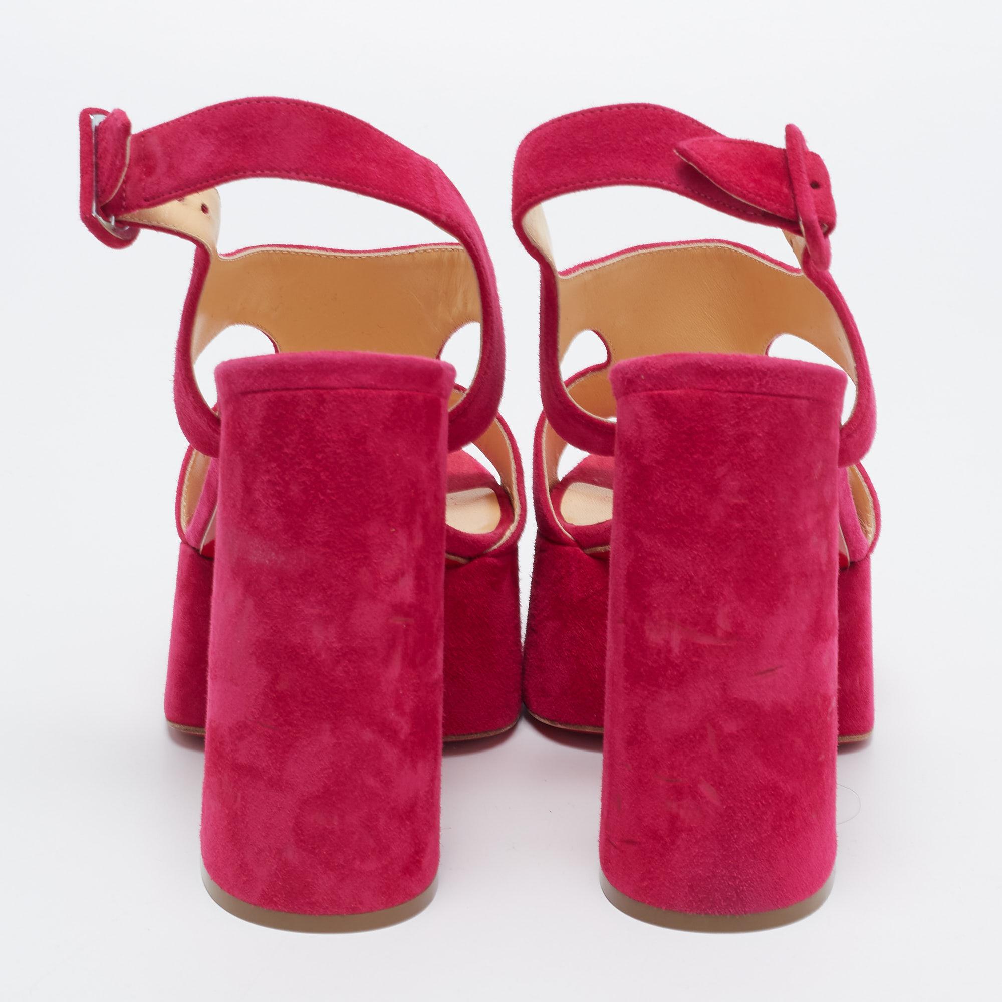 We love how the pink brings out the best of the shoe's design. These suede sandals by Christian Louboutin feature open toes, ankle strap closure, platforms, and block heels. Make these yours today!

