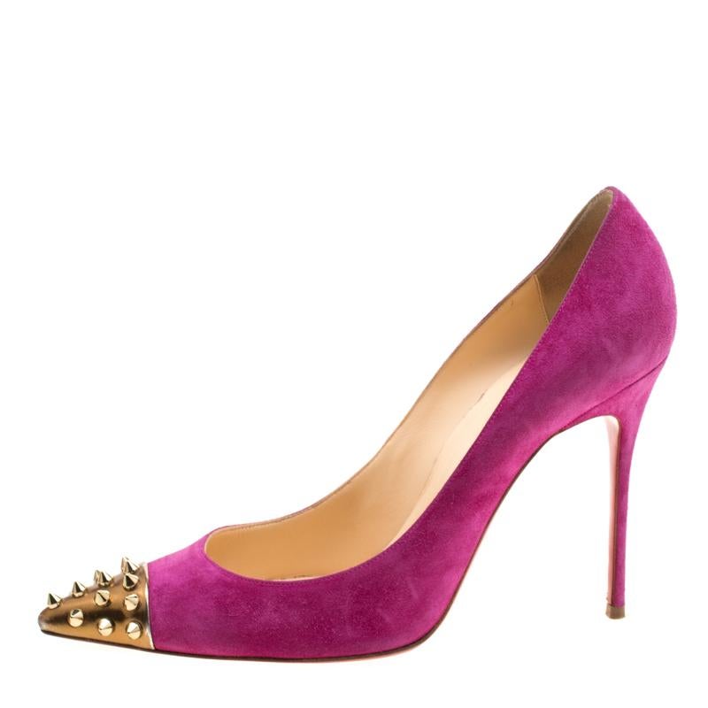 Be ready for praises and admirable gasps from your audience when you walk in these pumps from Christian Louboutin. Crafted from pink suede, they carry pointed toes and spikes decorated on the gold-tone cap toes. The pair is complete with 11 cm