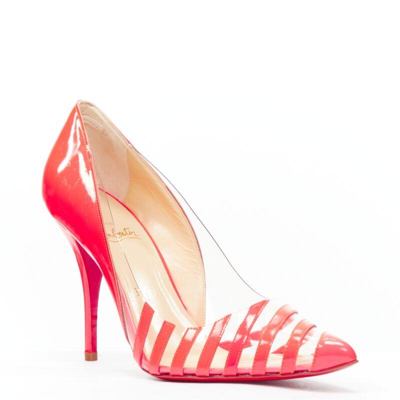CHRISTIAN LOUBOUTIN Pigalle 100 vernis PVC rayé rose fluo EU37.5
Référence : MELK/A00200
Marque : Christian Louboutin
Modèle : Pivichic 100
MATERIAL : Cuir verni, PVC
Couleur : rose
Motif : Rayé
Doublure :  Cuir
Fabriqué en : Italie

CONDITION