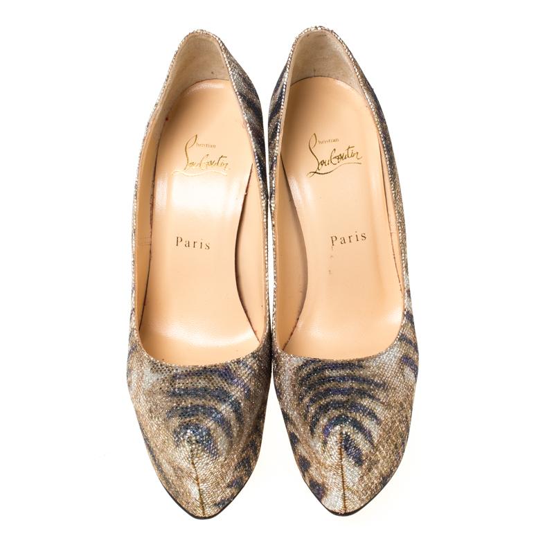 Take your love for Louboutins to new heights by adding this gorgeous pair to your collection. The pumps simply speak high fashion in every stitch and curve. The exteriors come made from printed Lamè fabric and the pumps are finished with platforms,