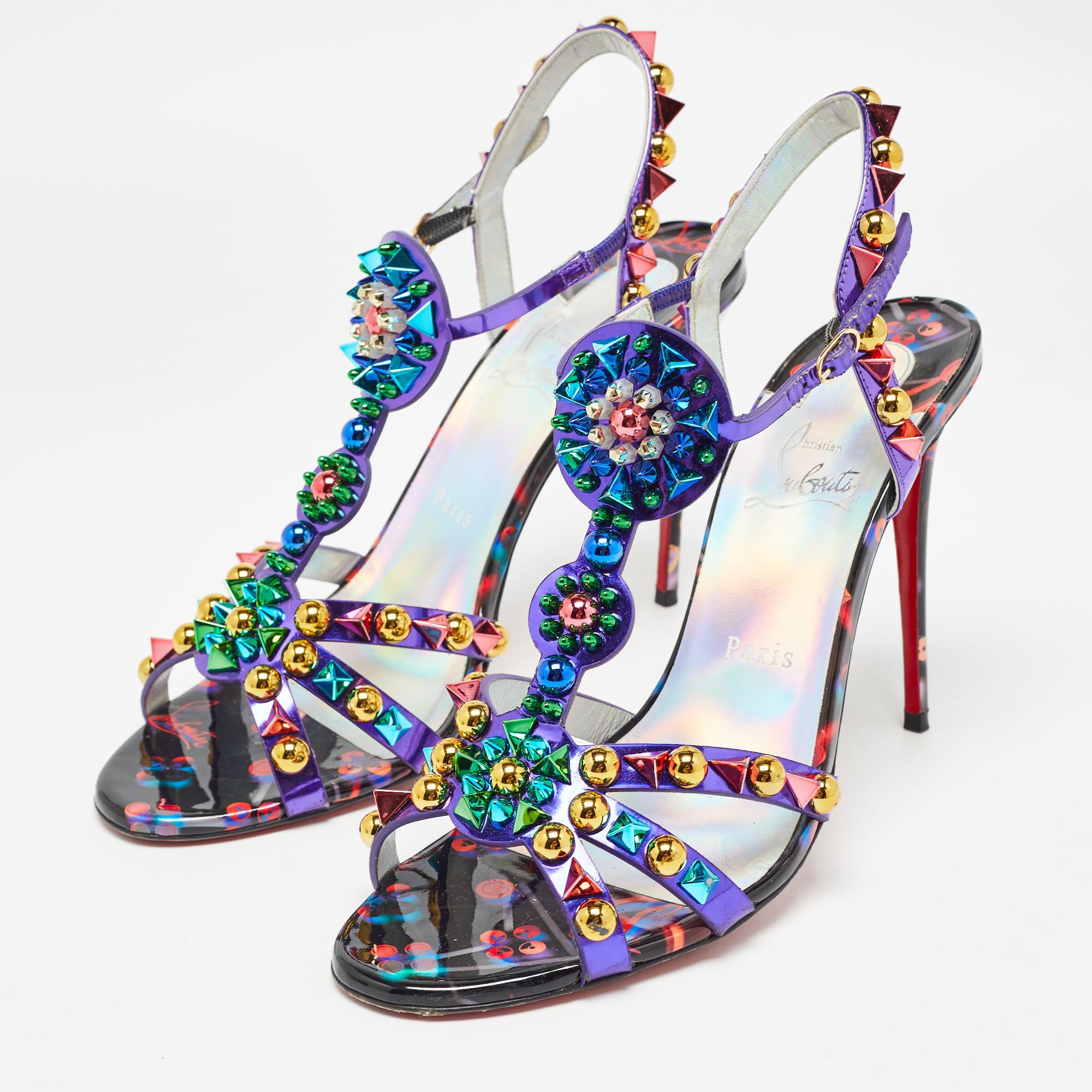 Discover footwear elegance with these Christian Louboutin embellished sandals. Meticulously designed, these heels marry fashion and comfort, ensuring you shine in every setting.