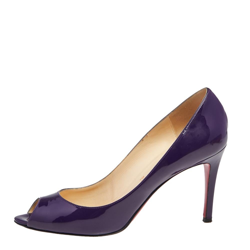 Presented by the House of Christian Louboutin, these You You peep-toe pumps are here to add a bit of glam to your attire! Made with purple patent leather on the upper with 8.5 cm heels, these pumps lend a luxe-aesthetic look and make you seem like a