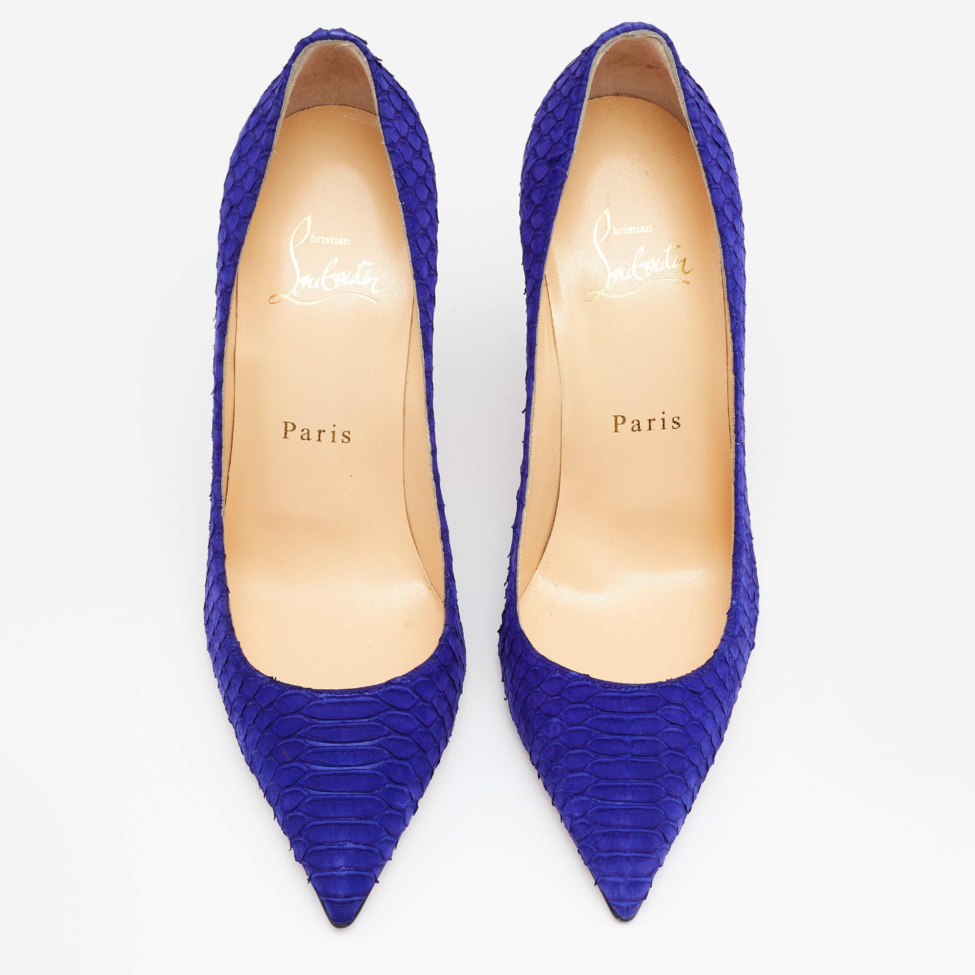 These curvaceous Christian Louboutin pumps are a timeless wardrobe staple. Crafted from exotic python skin in a purple shade, they feature well-lined insoles that offer endless comfort.

Includes: Original Dustbag, Original Box, Extra Heel tips