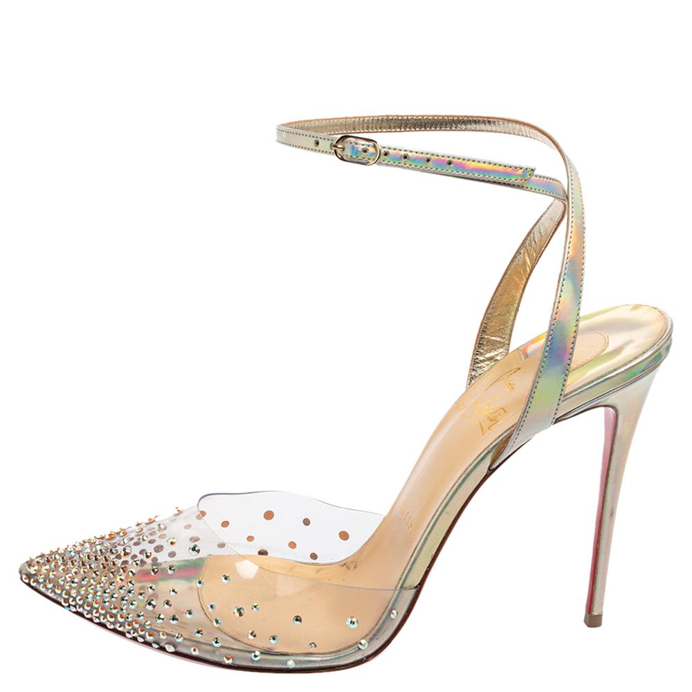 Elevate the look of your outfit with these impeccable Spikaqueen sandals from the House of Christian Louboutin. They are made from multicolored PVC and iridescent leather into an effortlessly-charming silhouette. They have embellished toes, an ankle